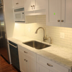 Sink in white remodeled kitchen