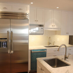 New kitchen with stainless steel fridge