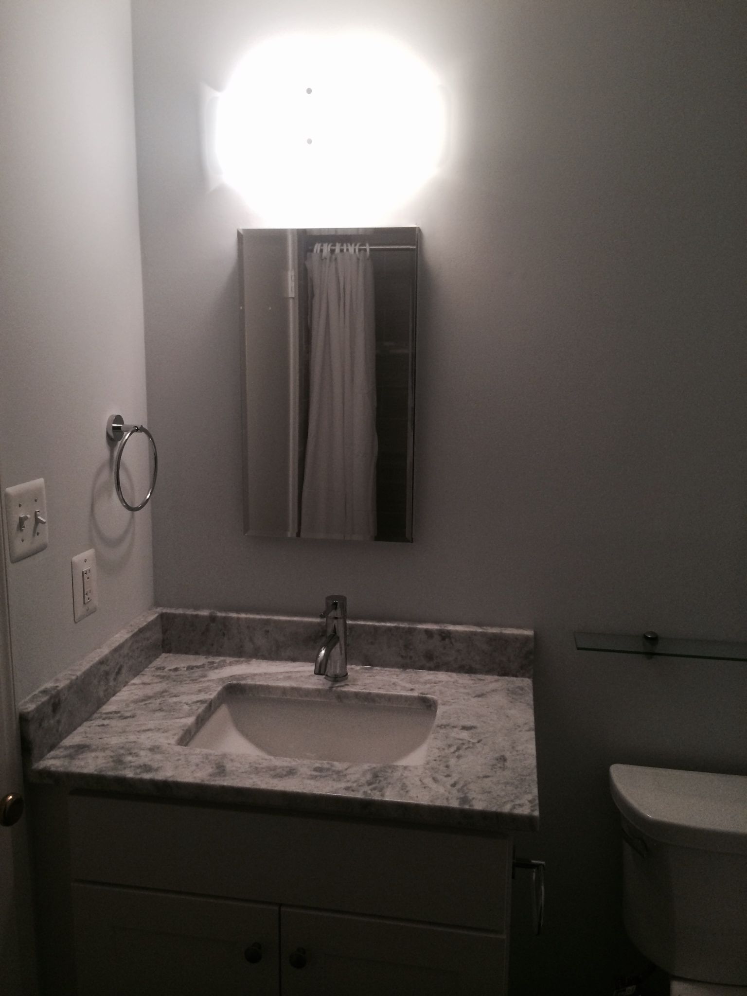 Gray remodeled bathroom in Rockville, MD