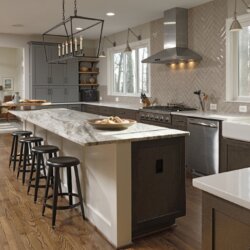 Island with stool seating in Leesburg kitchen
