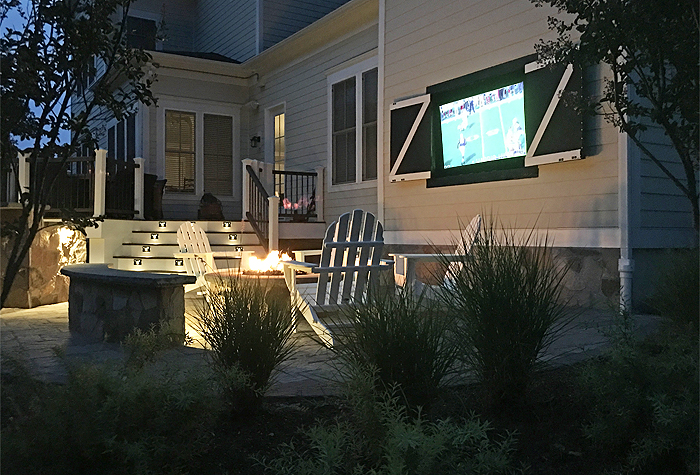 Photo: adding a fireplace to a patio - outdoor living fire pit by MBRG