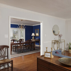 Archway leading from living room into dining room