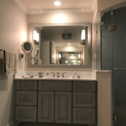 Master bathroom vanity with gray cabinetry