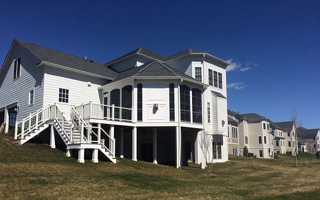 Deck and sunroom by MBRG