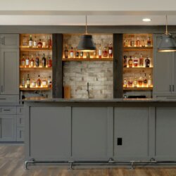 custom shelves and cabinets behind Finished Basement Ashburn VA