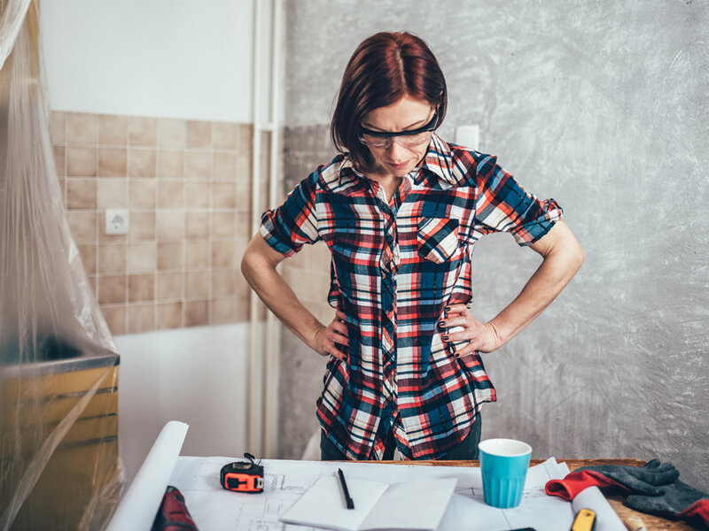 woman doing DIY home improvement project