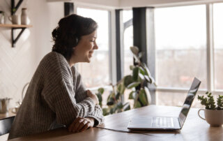 woman working from home video conference