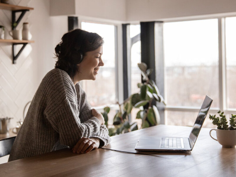 woman working from home video conference
